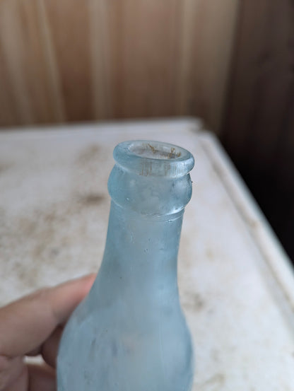 C Feuman Toronto Antique Embossed Aqua Blue Glass Soda Bottle