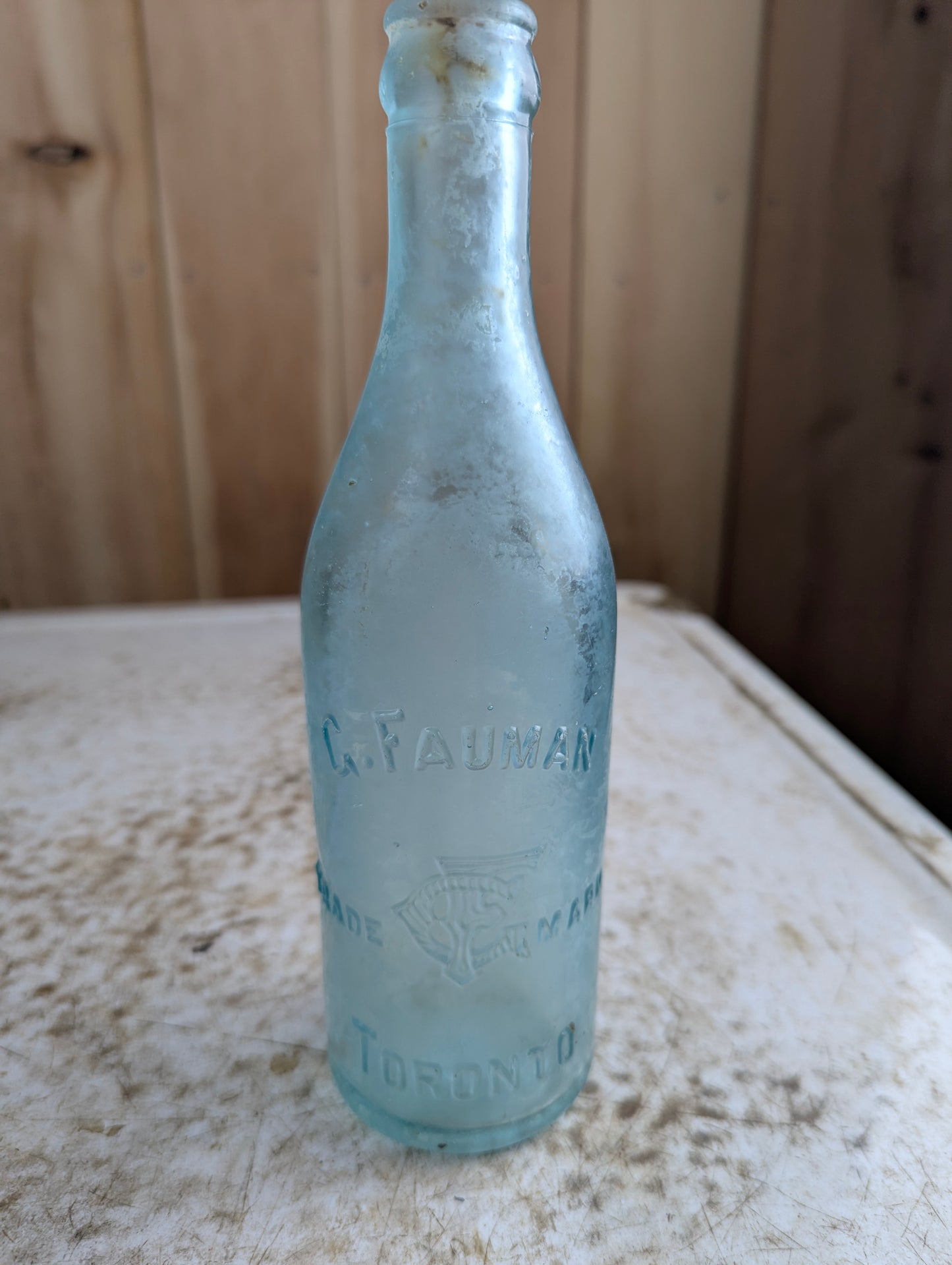 C Feuman Toronto Antique Embossed Aqua Blue Glass Soda Bottle