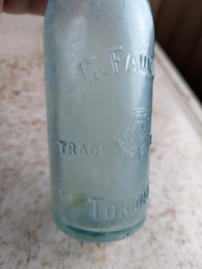 C Feuman Toronto Antique Embossed Aqua Blue Glass Soda Bottle