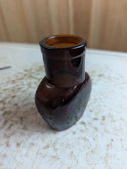 Vintage OXO 2oz Embossed Amber Glass Bottle