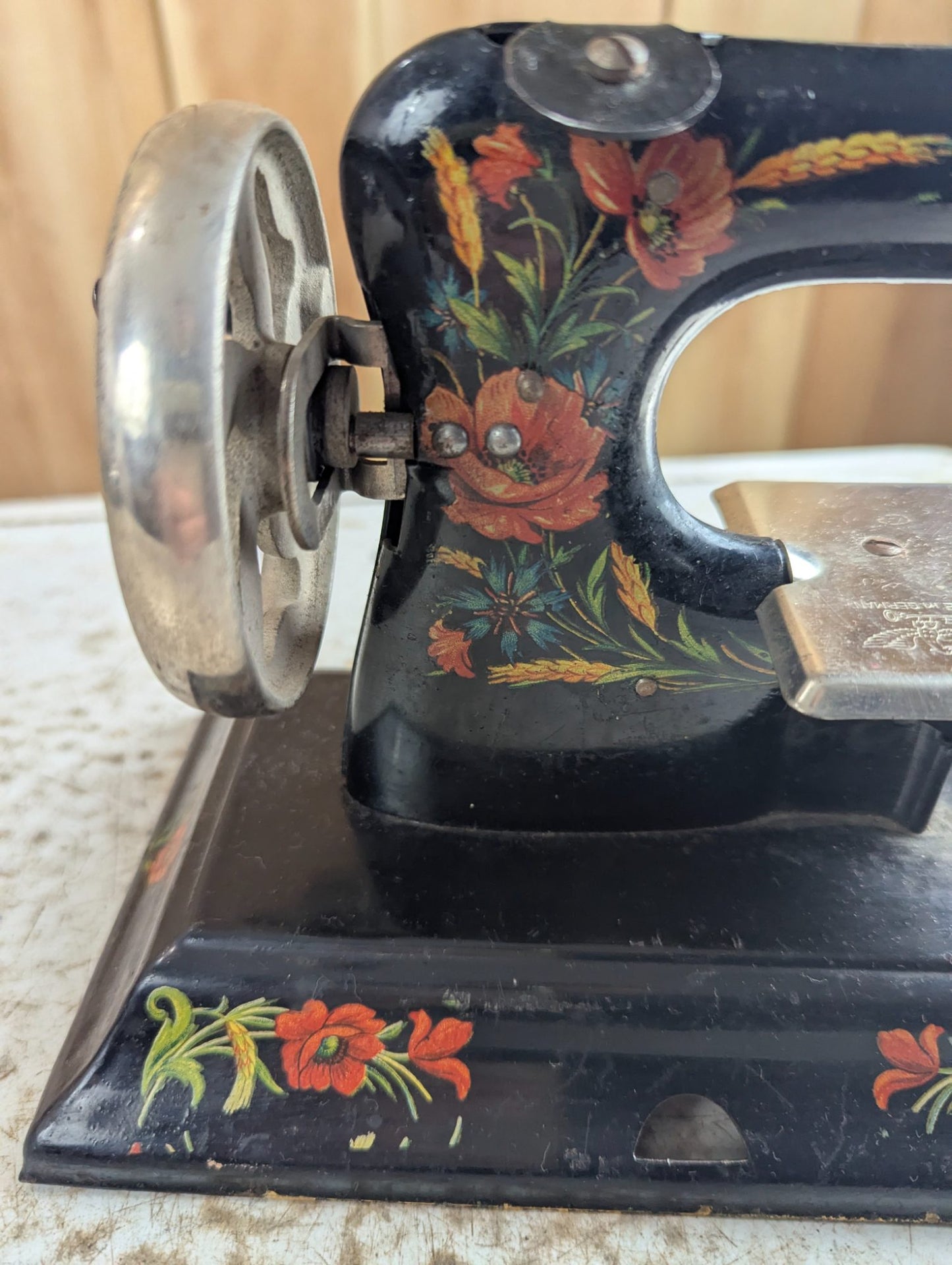 1920s Casige Metal Toy Sewing Machine with Floral Decals