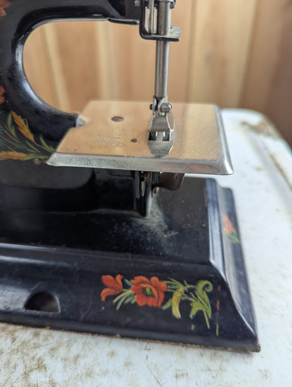 1920s Casige Metal Toy Sewing Machine with Floral Decals