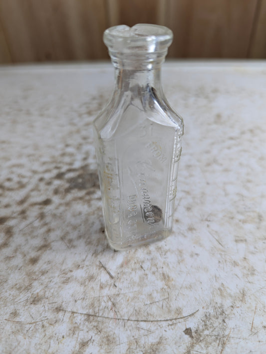 Antique Cinnamon's Drug Store Embossed Clear Glass Apothecary Medicine Bottle