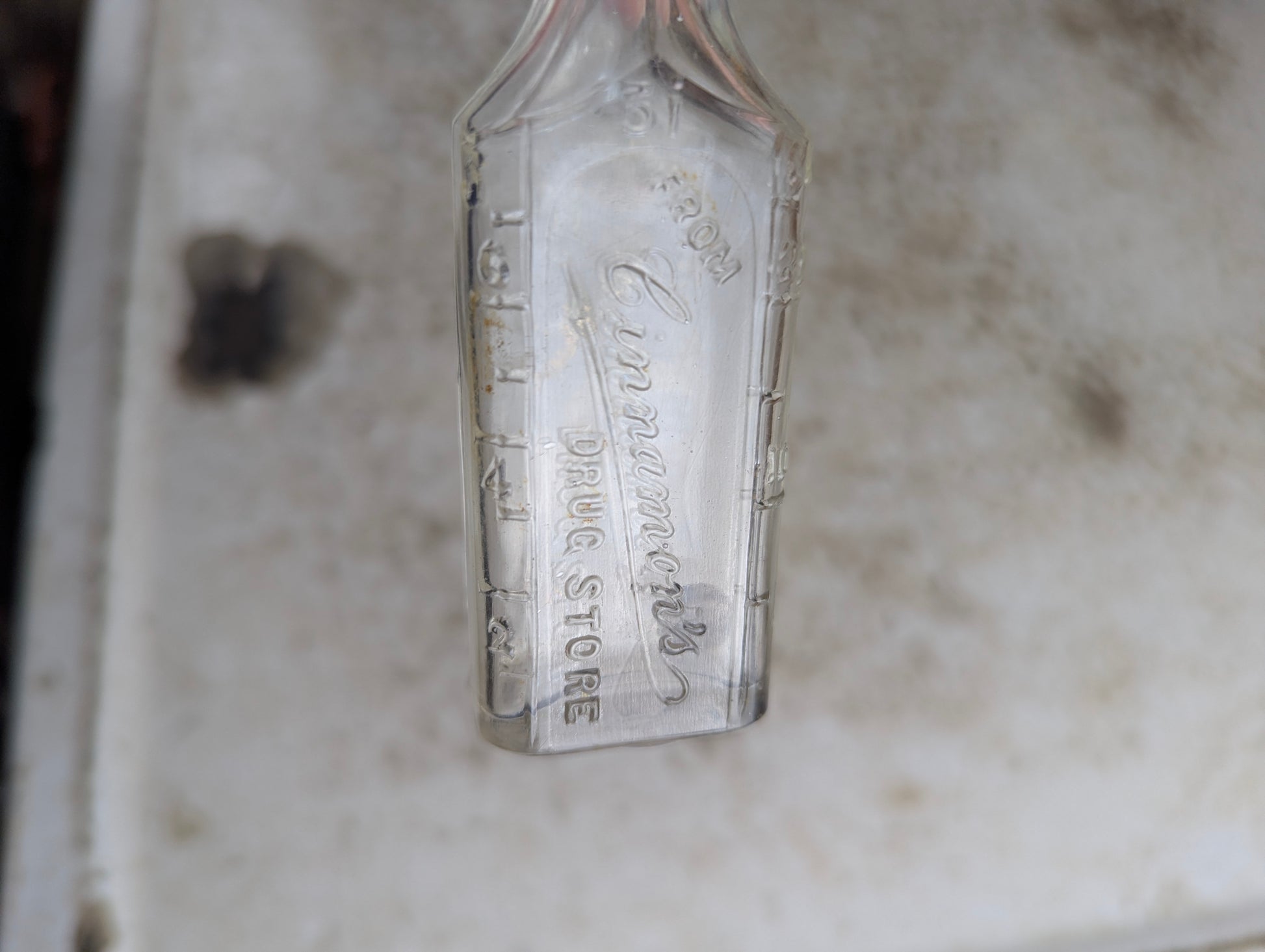 Antique Cinnamon's Drug Store Embossed Clear Glass Apothecary Medicine Bottle - view 2