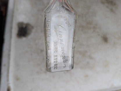 Antique Cinnamon's Drug Store Embossed Clear Glass Apothecary Medicine Bottle - view 2