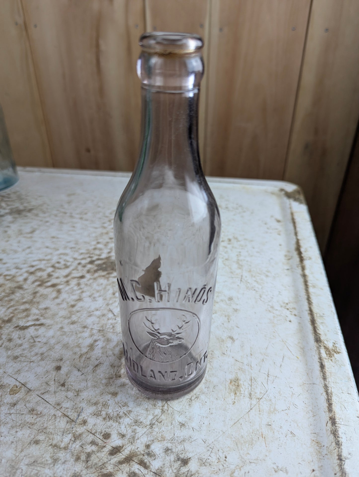 Antique M.C. Hinds Midland Amethyst Manganese Glass Embossed Soda Bottle