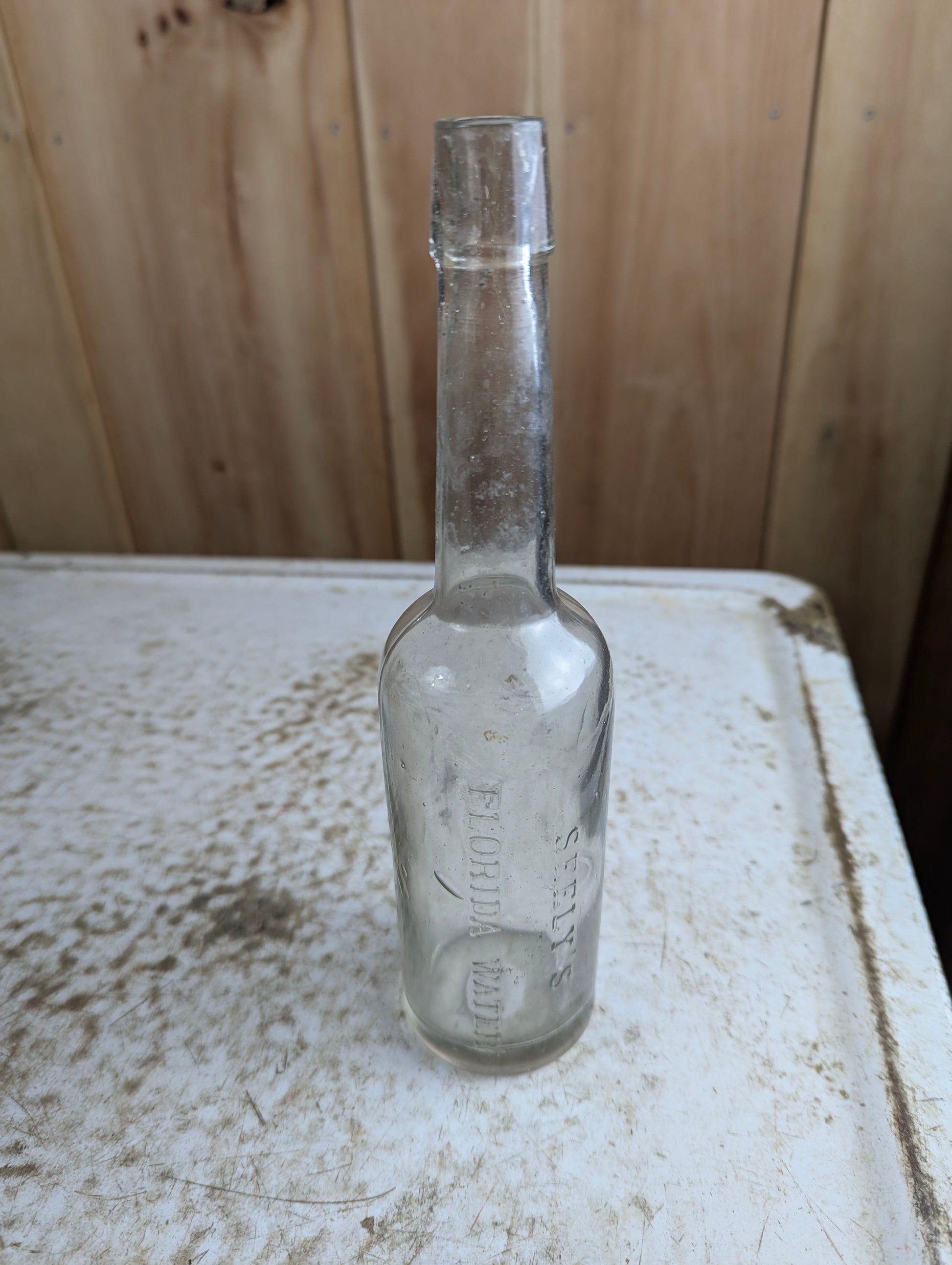 Antique Seely's Florida Water Clear Manganese Glass Citrus Cologne Bottle