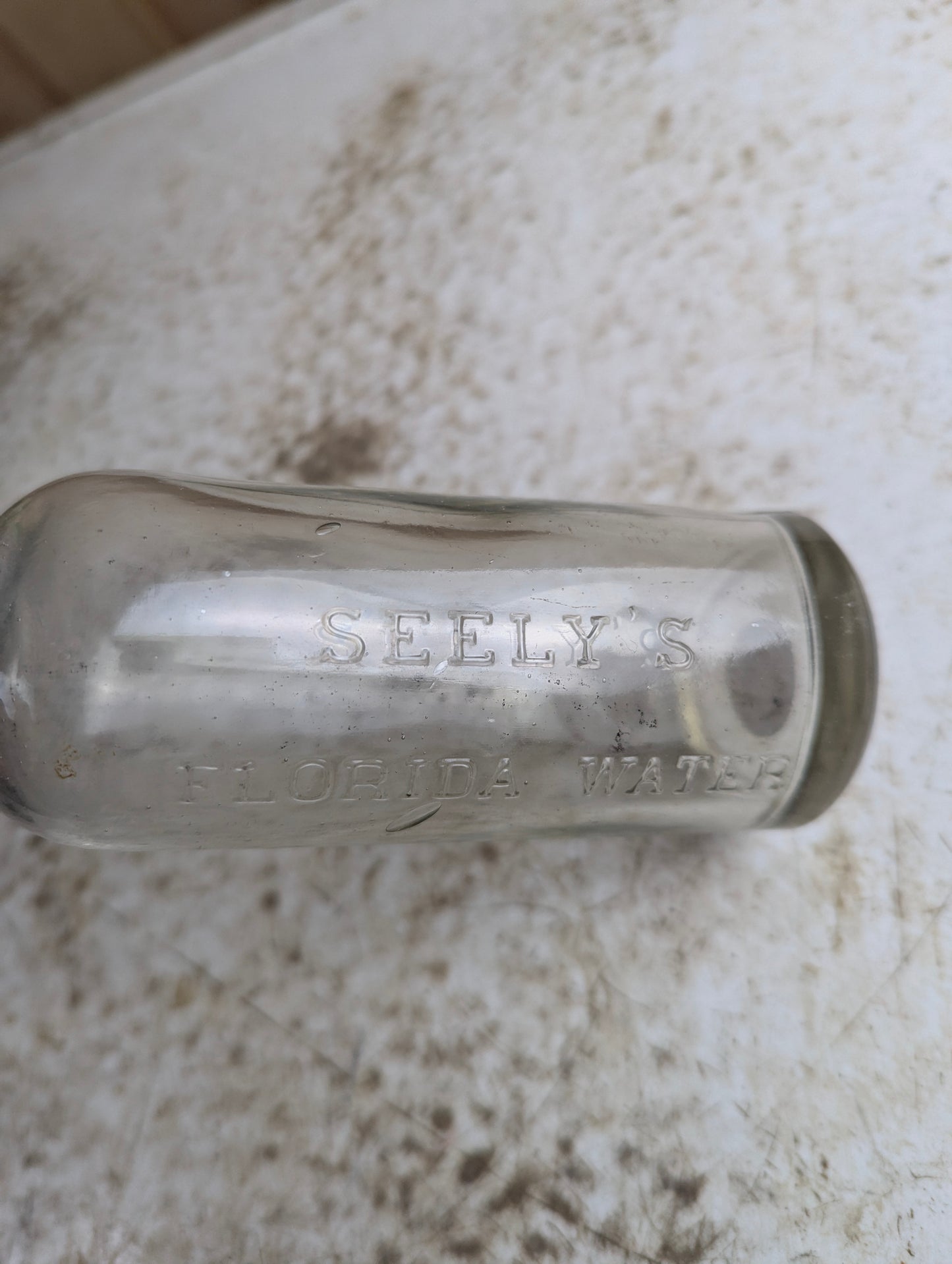 Antique Seely's Florida Water Clear Manganese Glass Citrus Cologne Bottle - view 3