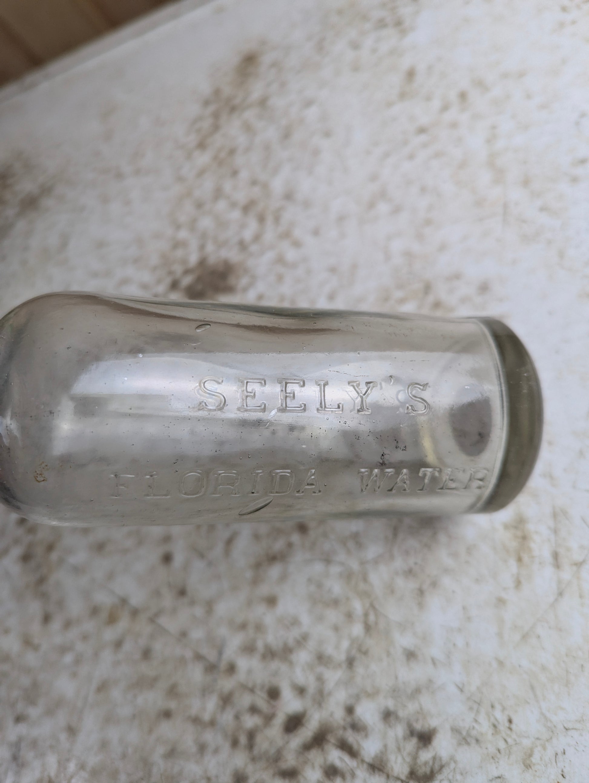 Antique Seely's Florida Water Clear Manganese Glass Citrus Cologne Bottle - view 3