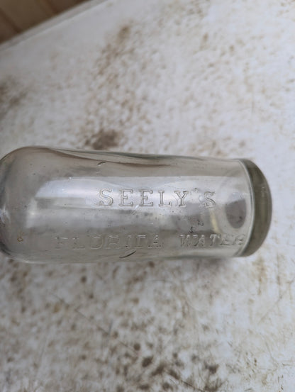 Antique Seely's Florida Water Clear Manganese Glass Citrus Cologne Bottle - view 3