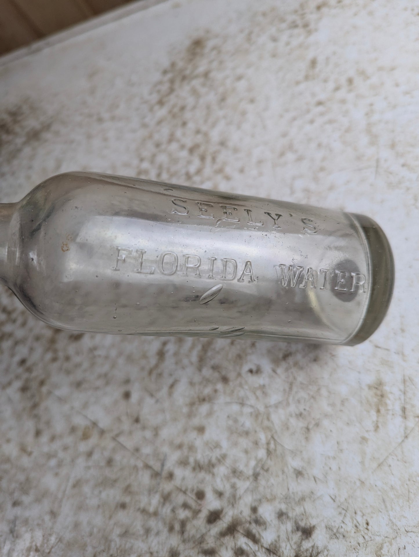 Antique Seely's Florida Water Clear Manganese Glass Citrus Cologne Bottle - view 4