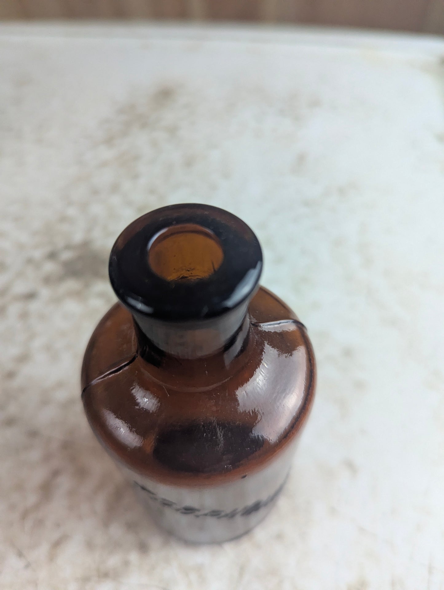 Antique Trophonine Reed & Carnrick Embossed Amber Glass Patent Medicine Bottle - view 2