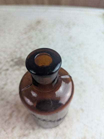 Antique Trophonine Reed & Carnrick Embossed Amber Glass Patent Medicine Bottle - view 2