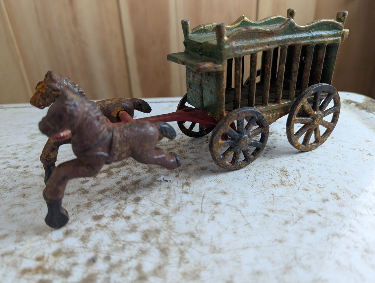 Vintage Cast Iron Horse-Drawn Carriage Toy with Green Canopy Coach