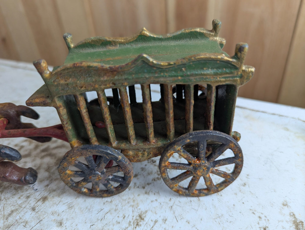 Vintage Cast Iron Horse-Drawn Carriage Toy with Green Canopy Coach