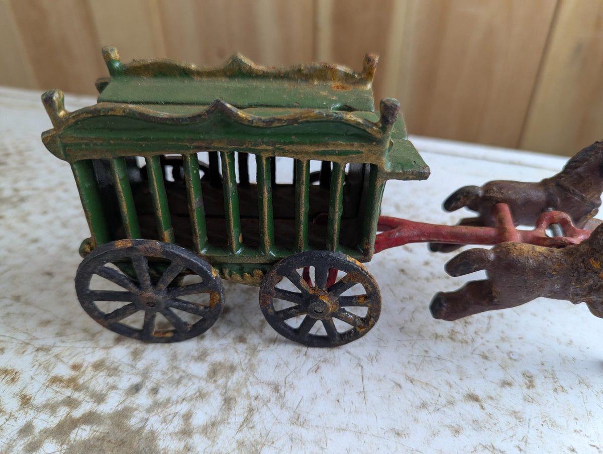 Vintage Cast Iron Horse-Drawn Carriage Toy with Green Canopy Coach
