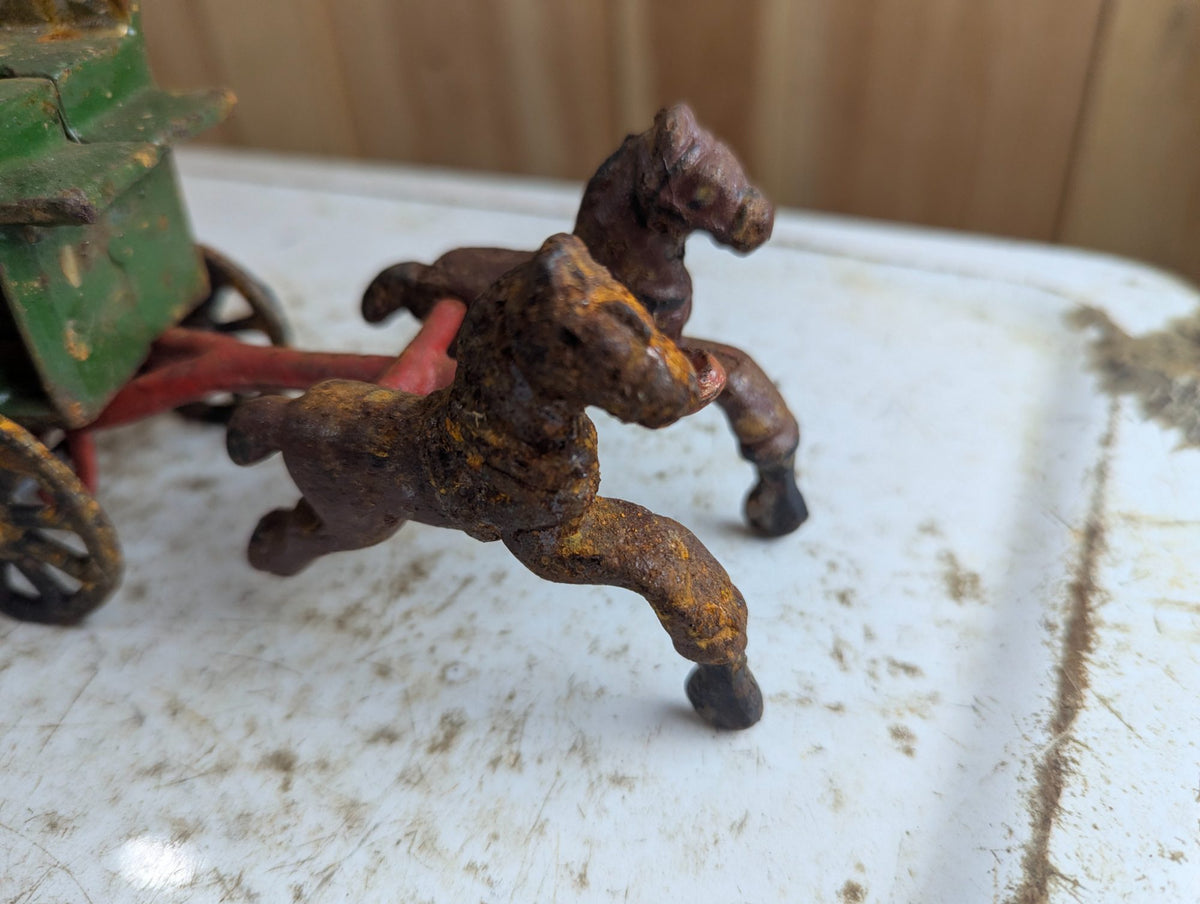 Vintage Cast Iron Horse-Drawn Carriage Toy with Green Canopy Coach