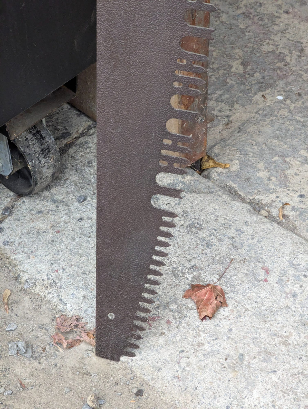 Vintage Oversized Metal Hand Saw Wall Art with Wood Handle