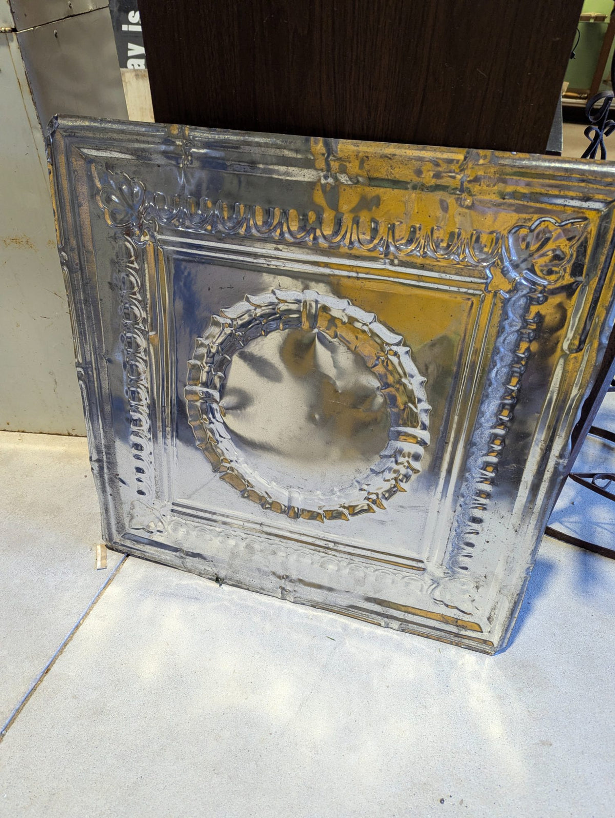 Antique Pressed Tin Ceiling Tile with Scrolled Border and Wreath Medallion