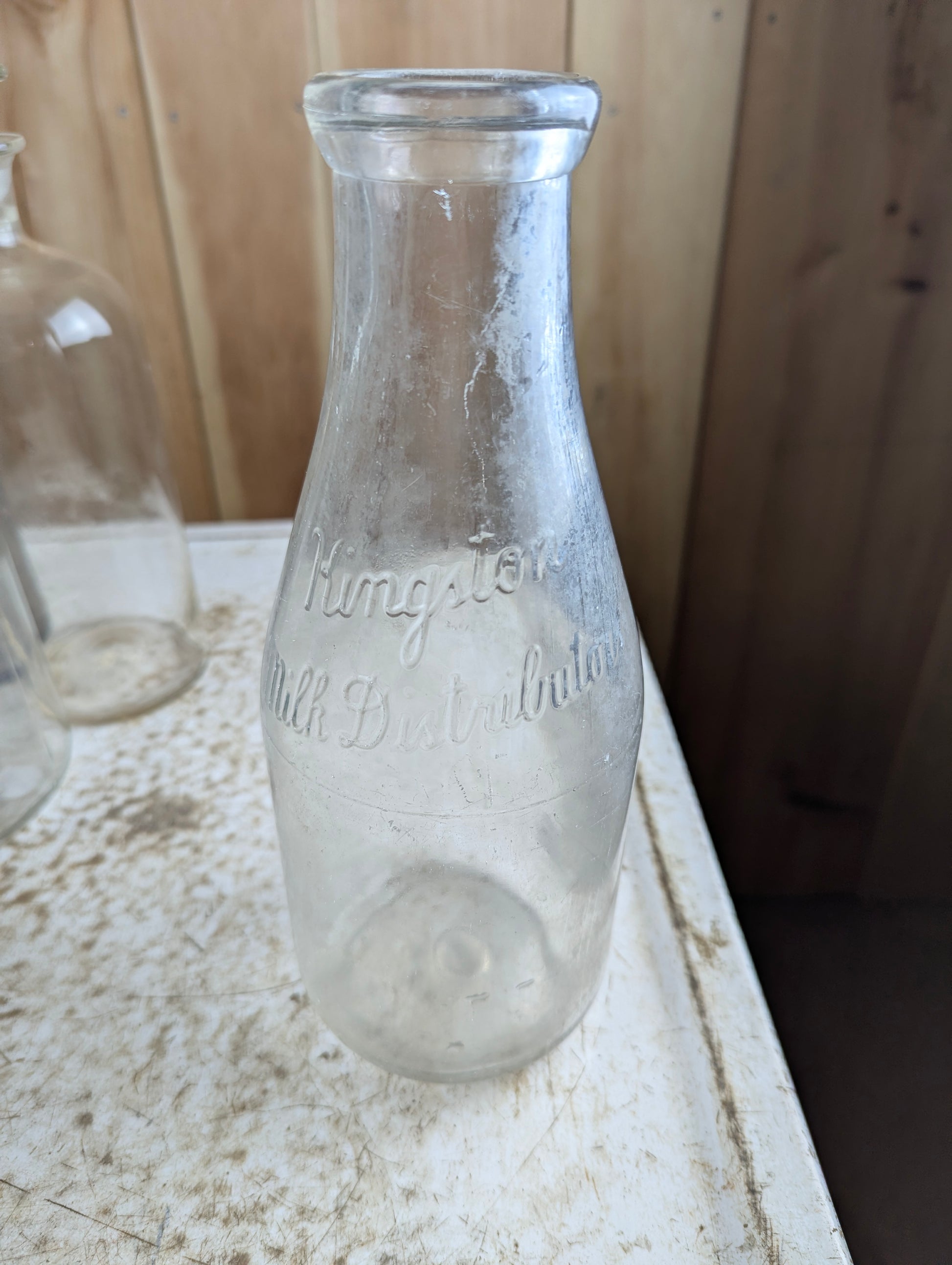 Kingston Milk Distributors Embossed Quart Glass Milk Bottle
