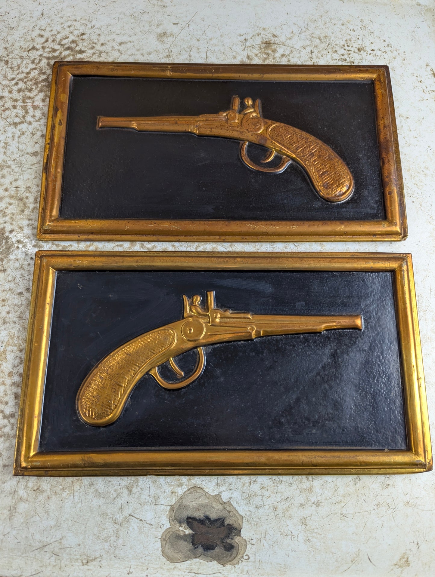 Pair Vintage Pressed Metal Flintlock Wall Art