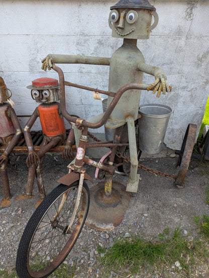 Scrap Art Man on Bicycle