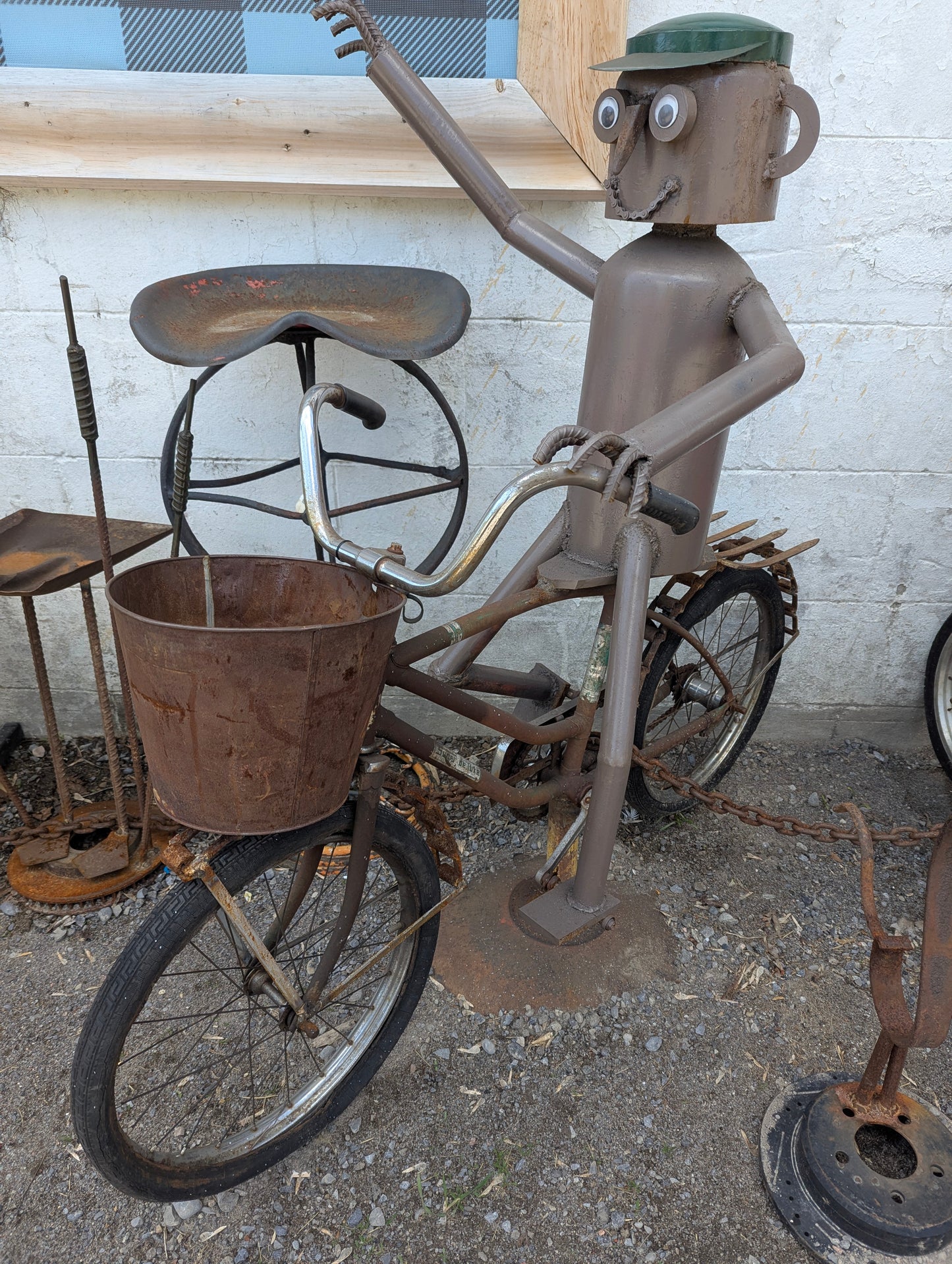 Scrap Art Man Riding Bicycle