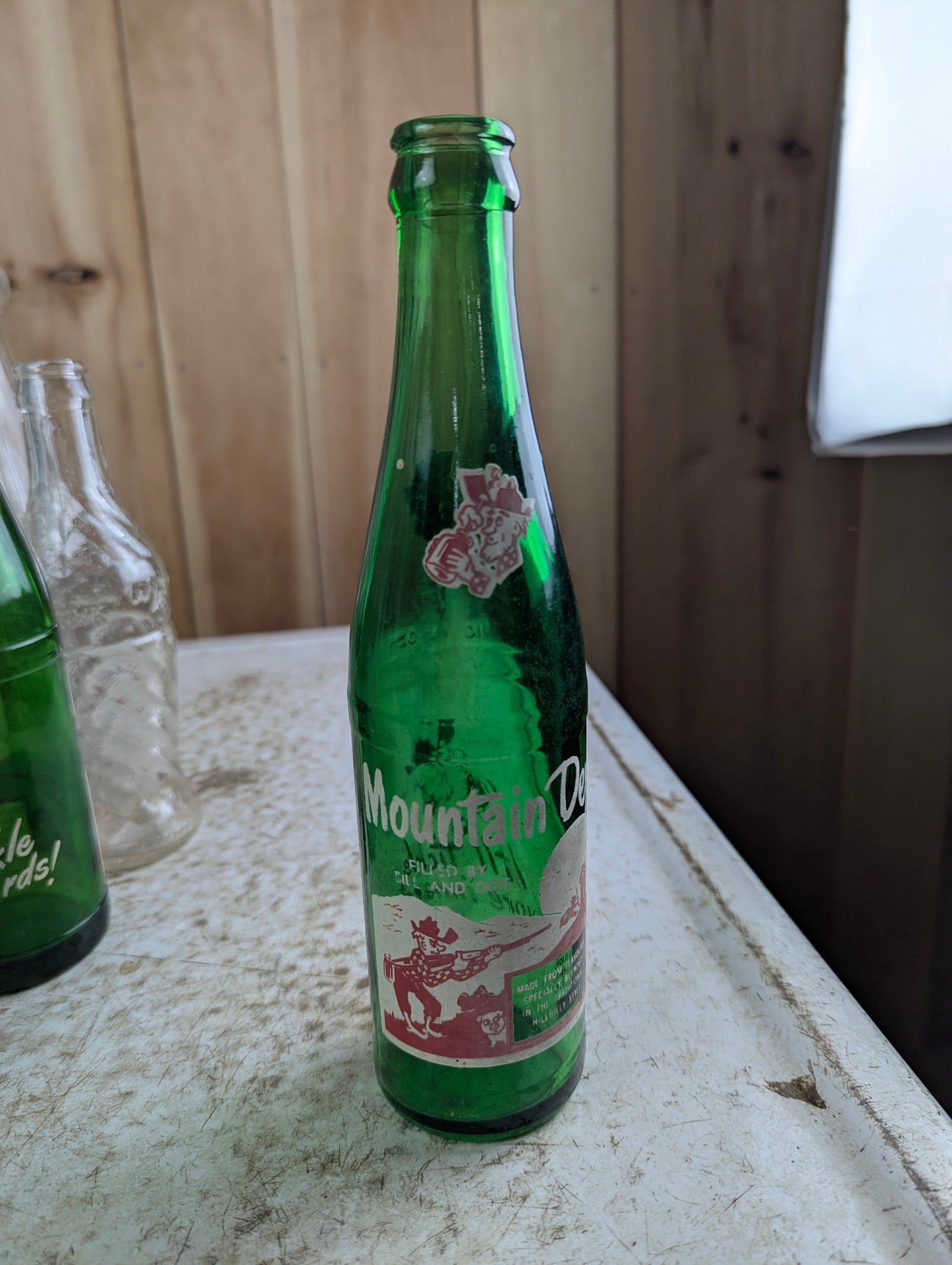 Vintage Mountain Dew 10oz Hillbilly 'Filled by Bill and Dot'  Green Glass ACL Soda Bottle