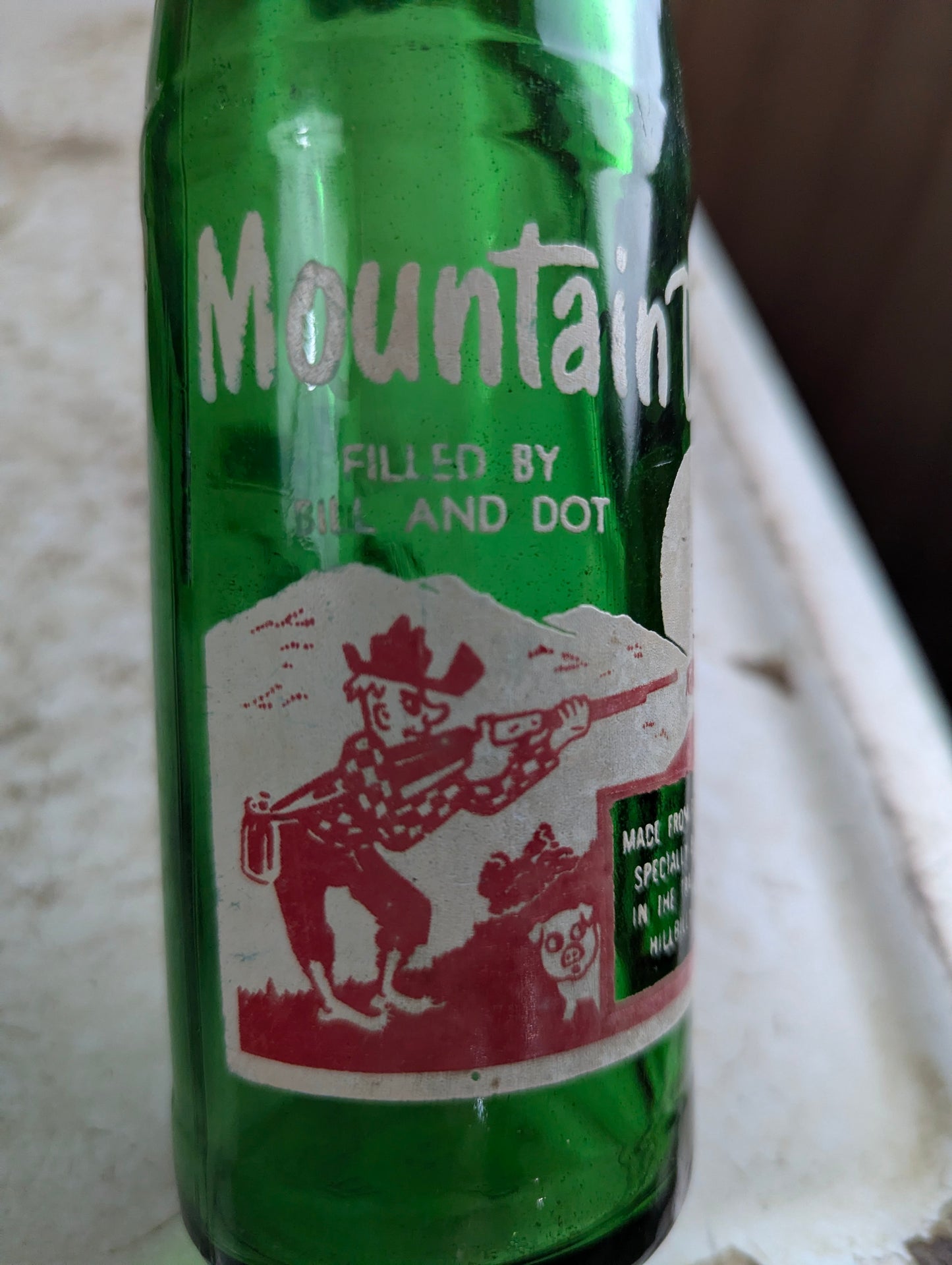 Vintage Mountain Dew 10oz Hillbilly 'Filled by Bill and Dot'  Green Glass ACL Soda Bottle - view 2