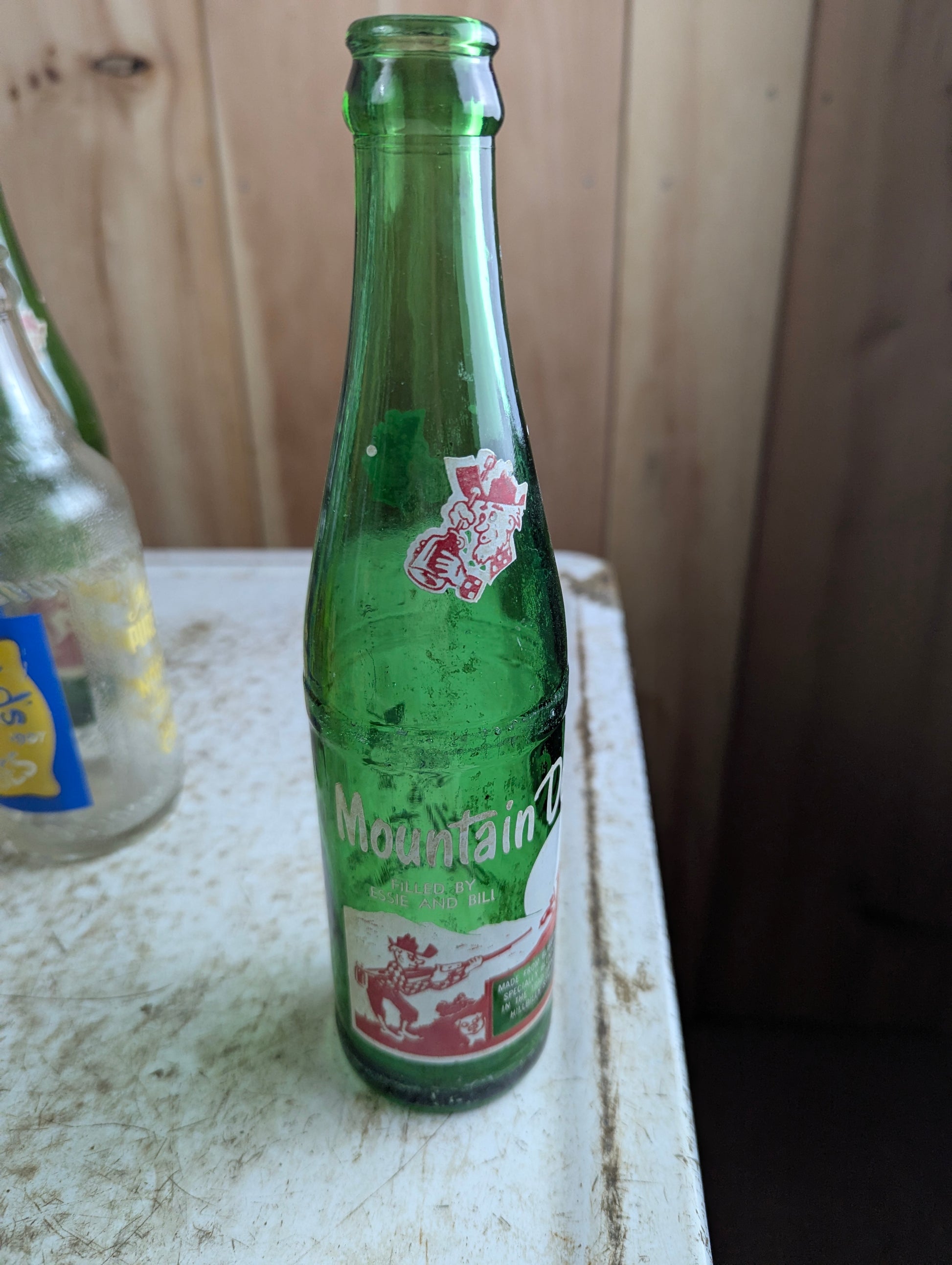 Vintage Mountain Dew 10oz Hillbilly 'Filled by Essie and Bill'  Green Glass ACL Soda Bottle