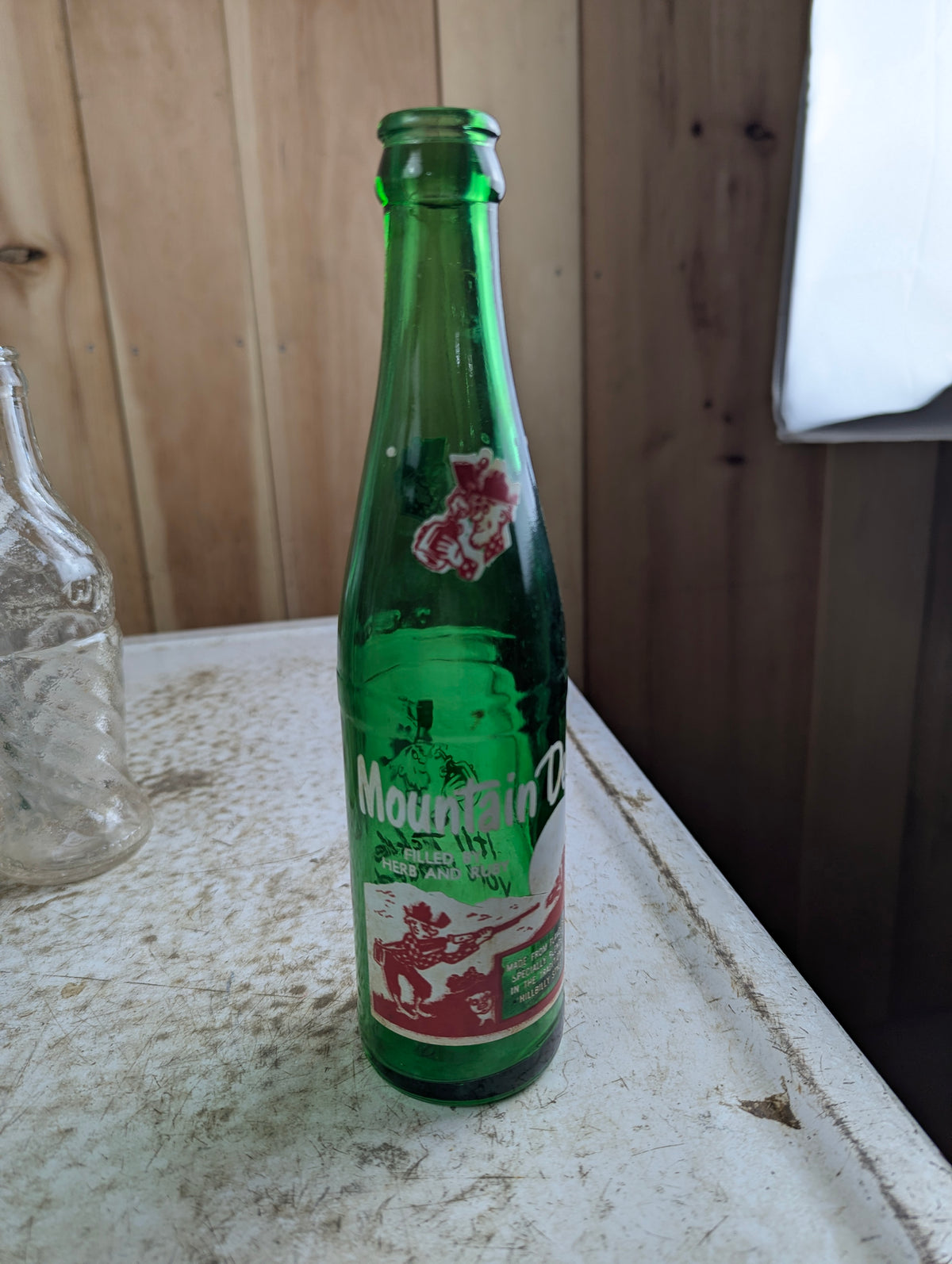 Vintage Mountain Dew 10oz Hillbilly 'Filled by Herb and Ruby'  Green Glass ACL Soda Bottle