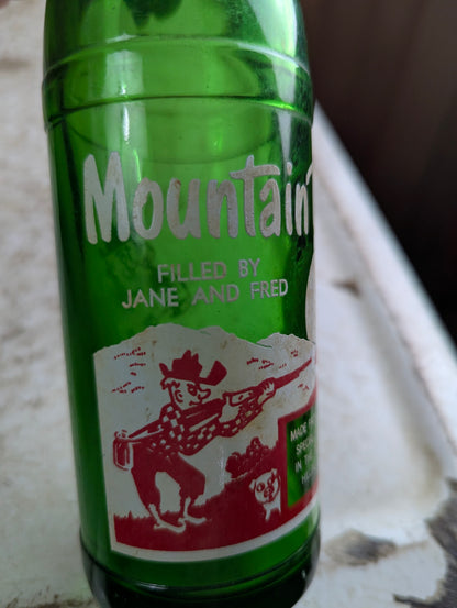 Vintage Mountain Dew 10oz Hillbilly 'Filled by Jane and Fred'  Green Glass ACL Soda Bottle