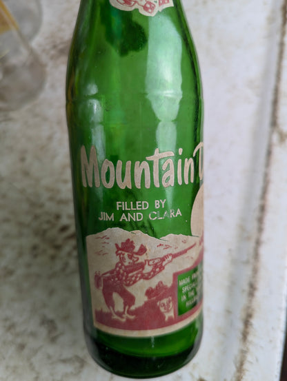 Vintage Mountain Dew 10oz Hillbilly 'Filled by Jim and Clara'  Green Glass ACL Soda Bottle - view 2