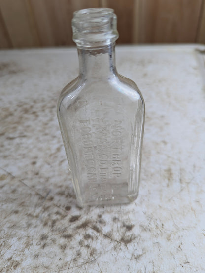 Vintage Northrop and Lyman S.N. Thomas Eclectric Oil Clear Glass Patent Medicine Bottle